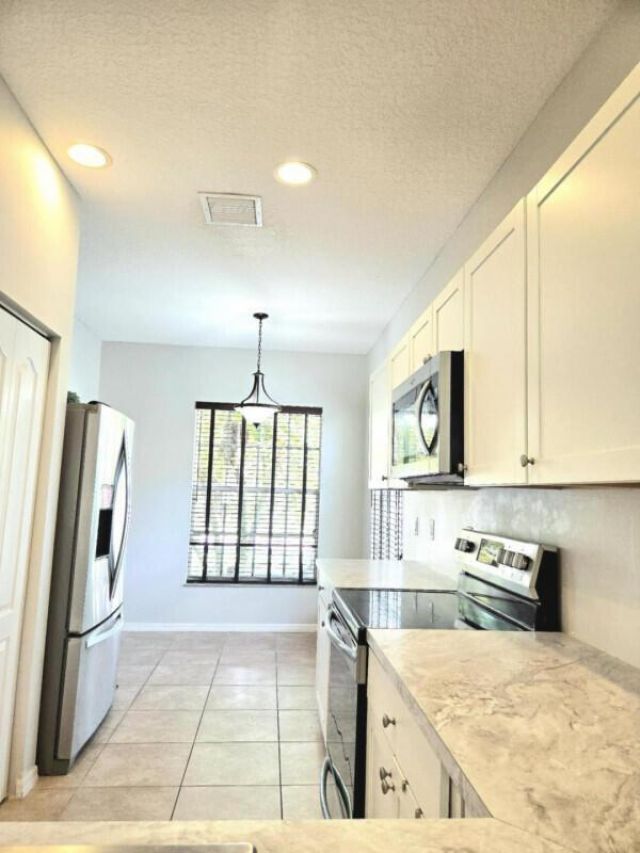 9658 SW Lindale Trace Boulevard, Port Saint Lucie, FL 34987 Photo