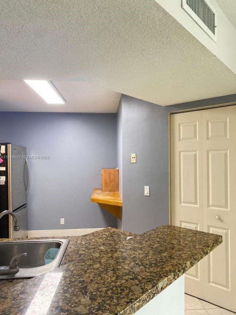 8901 Wiles Rd, Unit 103, Coral Springs, FL 33067 Photo