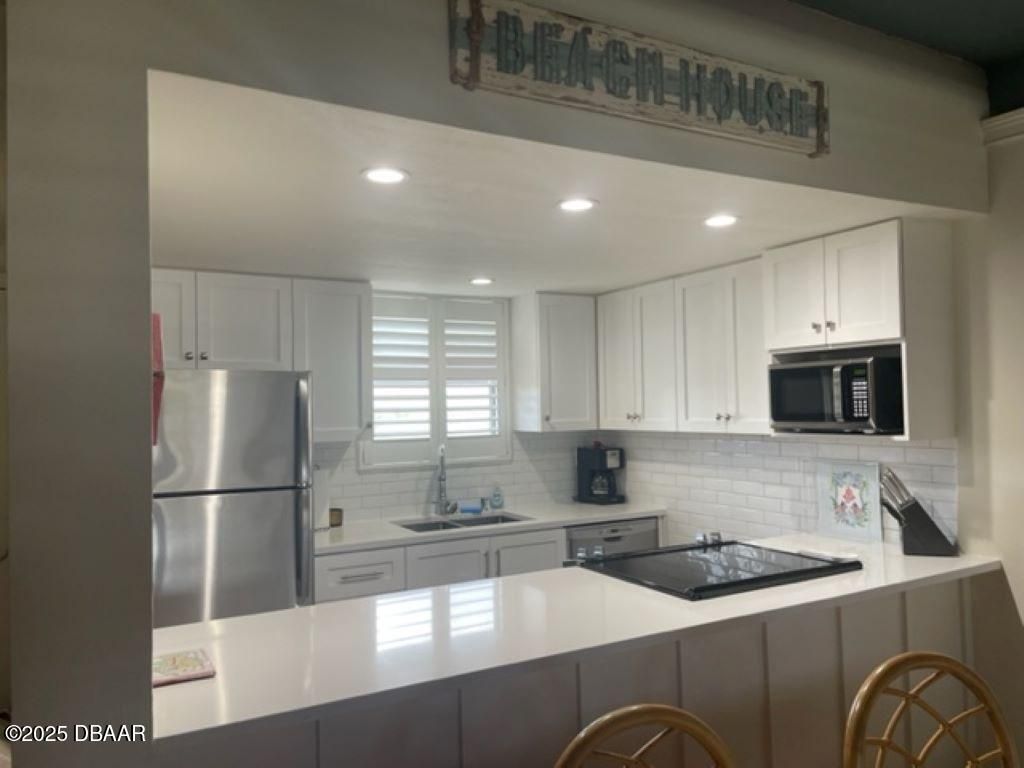 4849 Saxon Drive, Unit C102, New Smyrna Beach, FL 32169 Photo