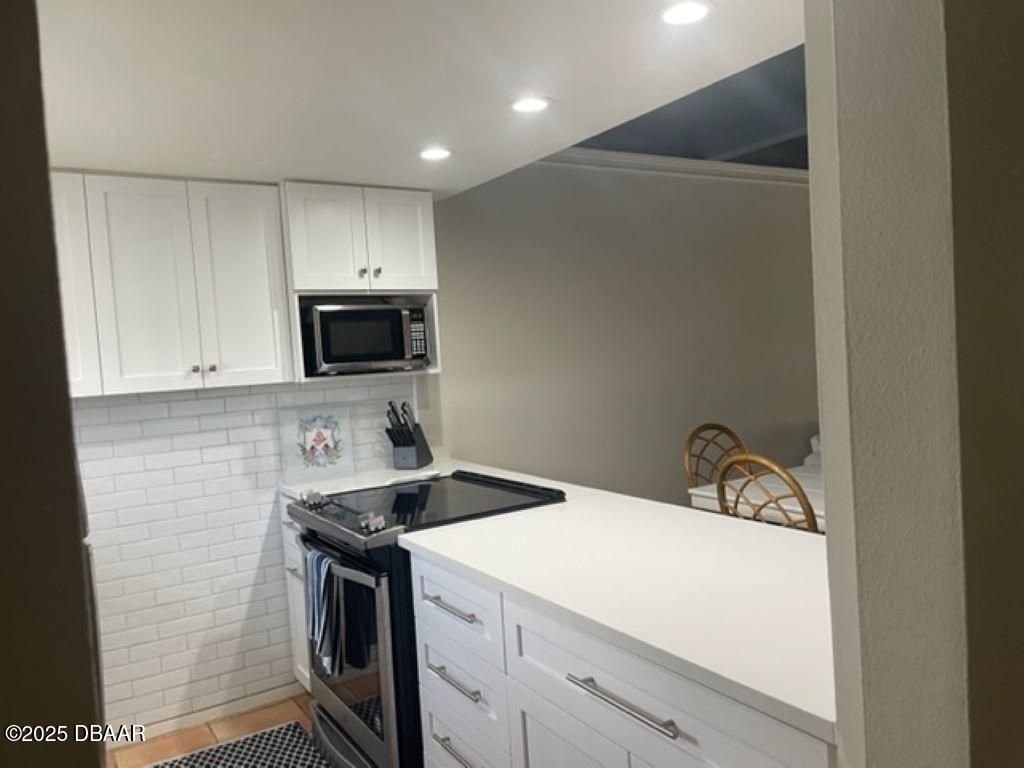 4849 Saxon Drive, Unit C102, New Smyrna Beach, FL 32169 Photo