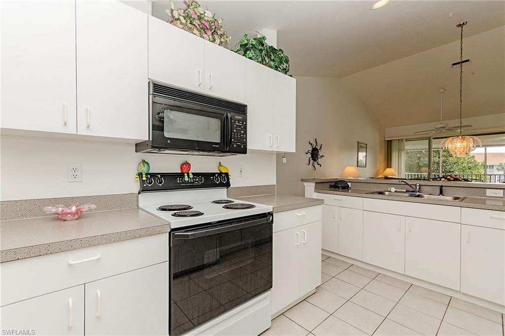 4910 Deerfield Way, Unit A-203, Naples, FL 34110 Photo