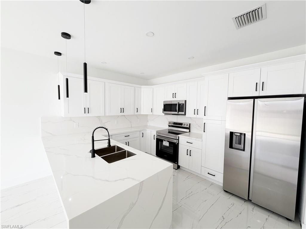 4412-4414 14th St Sw, Lehigh Acres, FL 33979 Photo