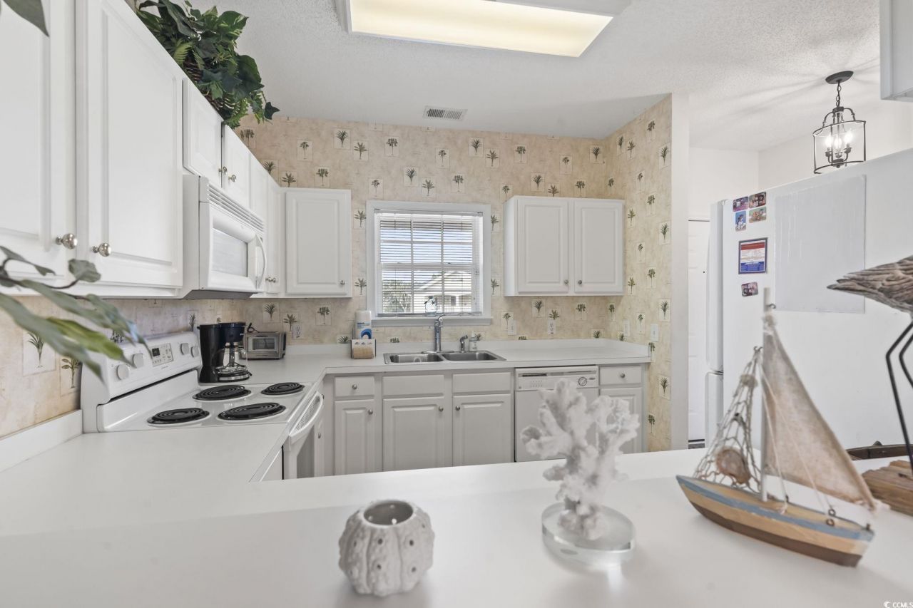 5801 Oyster Catcher Dr. Photo 27