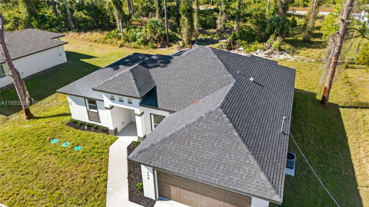 220 Lomax Ave, Lehigh Acres, FL 33974 Photo