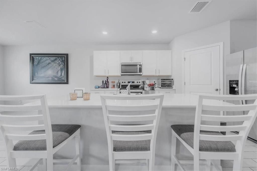 1216 NW 21st Pl, Cape Coral, FL 33993 Photo
