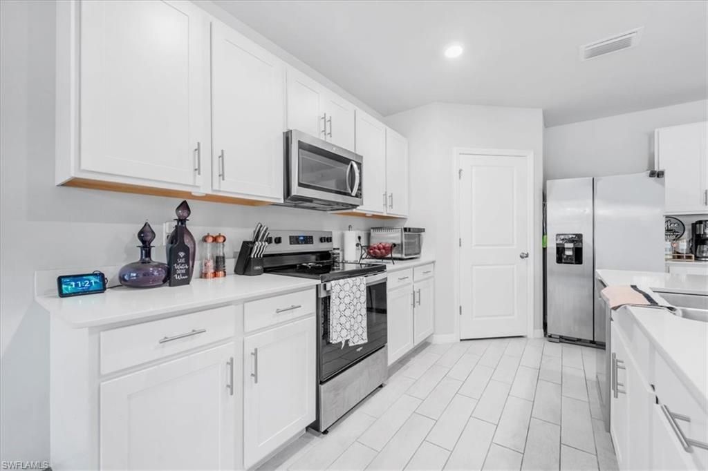1216 NW 21st Pl, Cape Coral, FL 33993 Photo