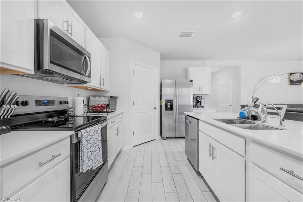 1216 NW 21st Pl, Cape Coral, FL 33993 Photo