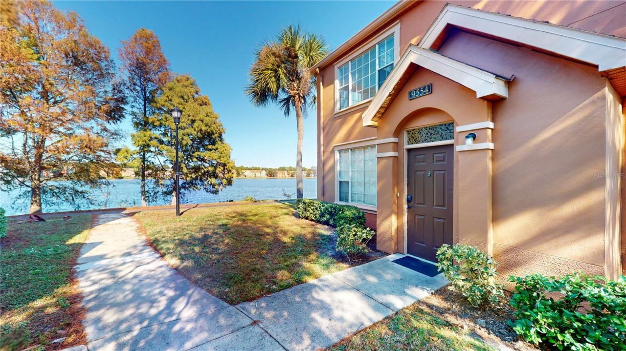 9554 Lake Chase Island Way, Unit 9554, Tampa, FL 33626 Main Photo