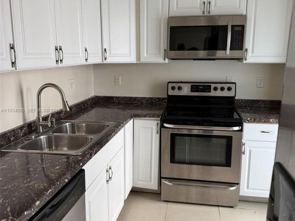 301 Golden Isles Dr, Unit 112, Hallandale Beach, FL 33009