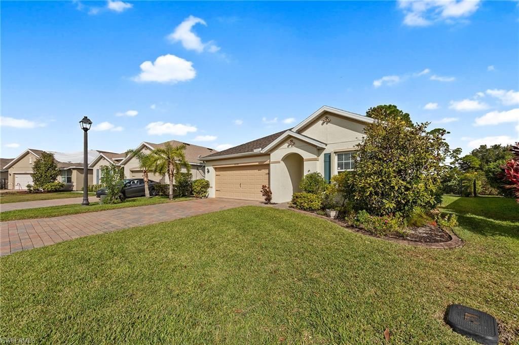10528 Canal Brook Ln, Lehigh Acres, FL 33936 Photo
