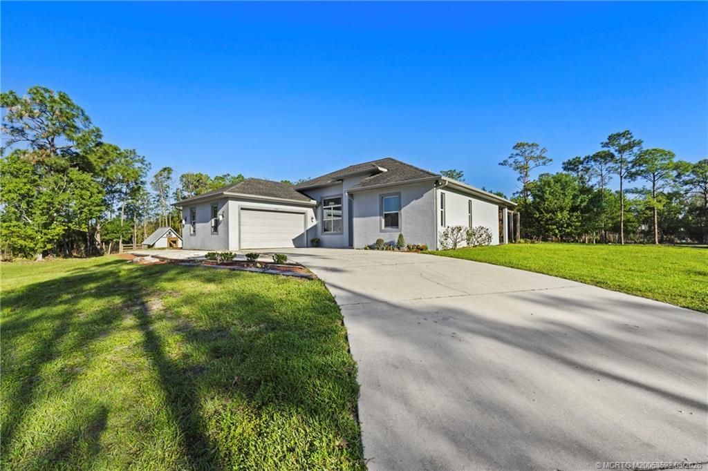 6347 SW Travers Street, Palm City, FL 34990 Photo