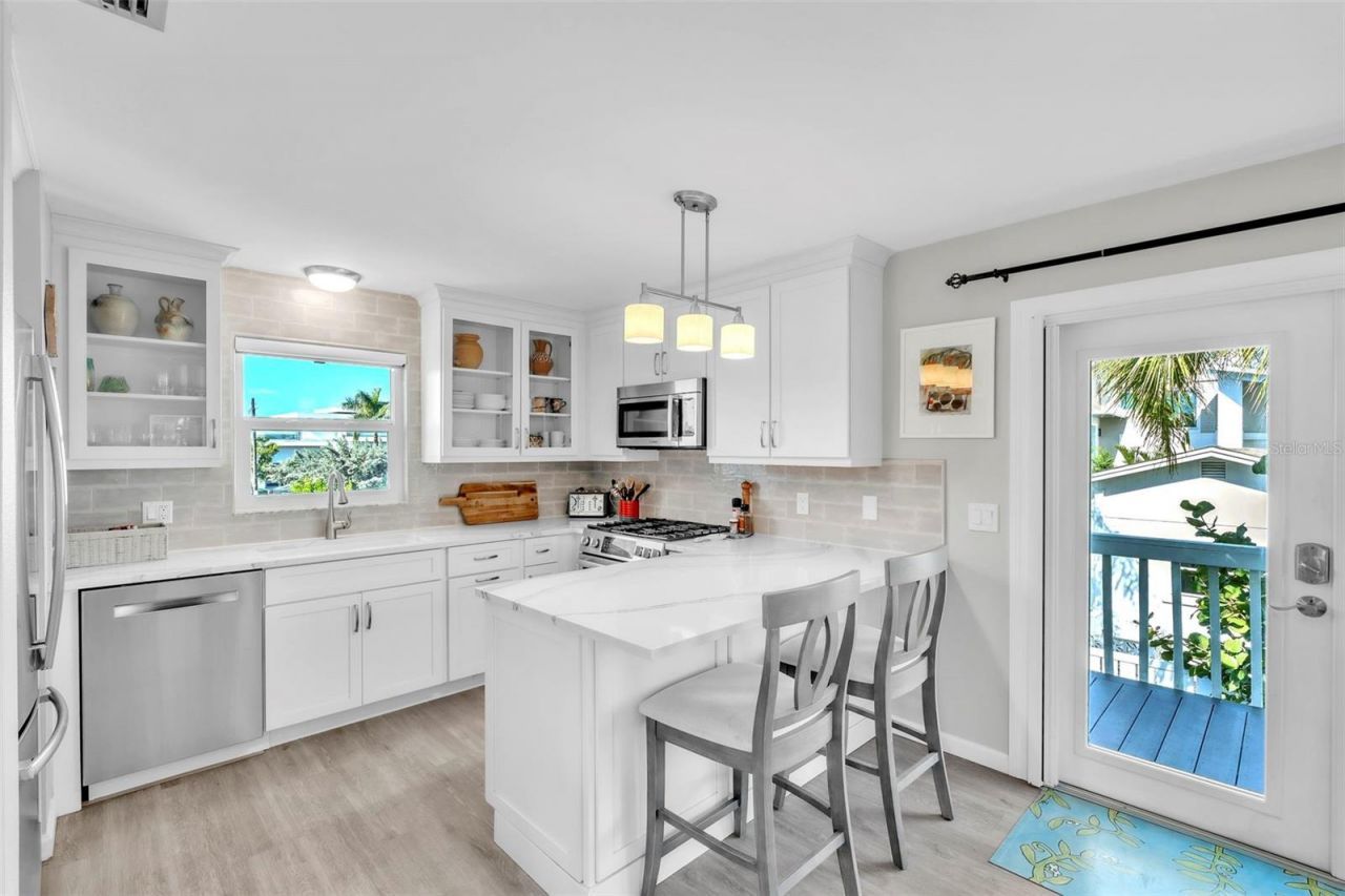 8302 Marina Drive, Holmes Beach, FL 34217 Photo