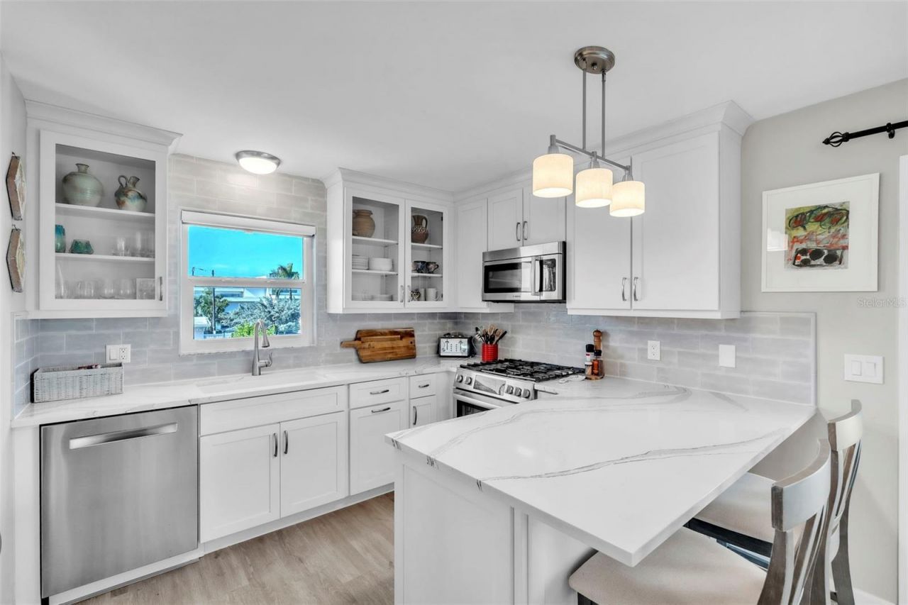 8302 Marina Drive, Holmes Beach, FL 34217 Photo