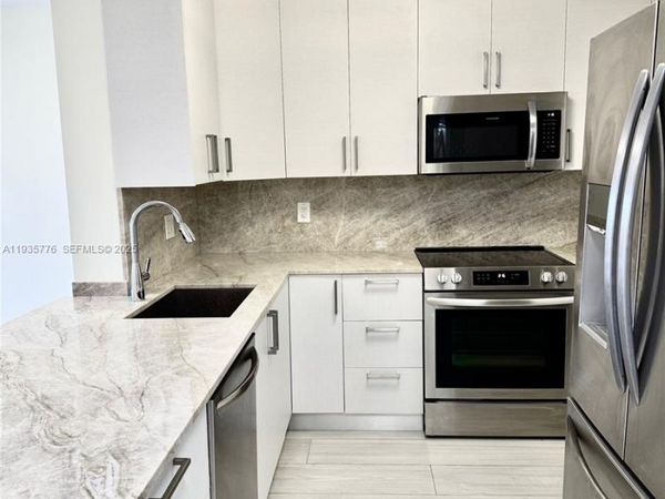 401 Golden Isles Dr, Unit 701, Hallandale Beach, FL 33009