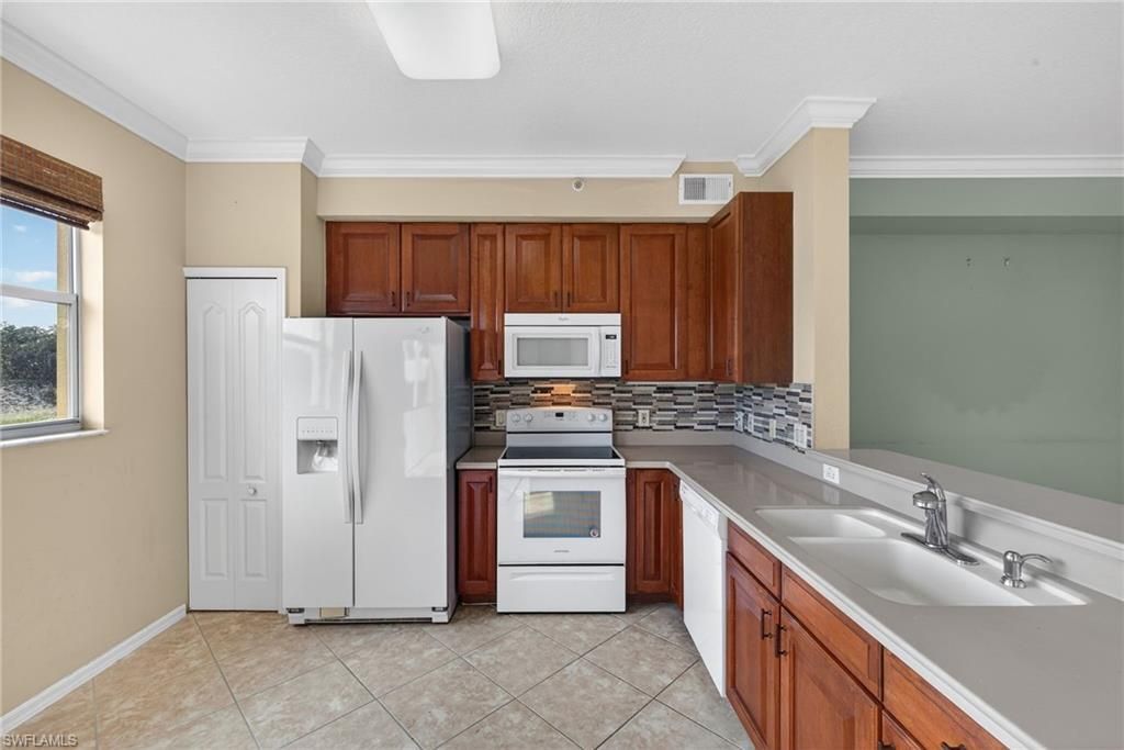 6816 Sterling Greens Pl, Unit 303, Naples, FL 34104 Photo