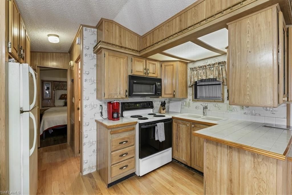 211 Sojourn Dr , North Fort Myers, FL 33903 Photo