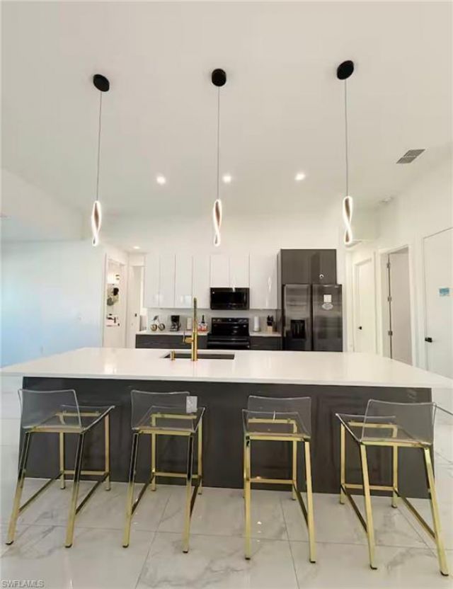 523 NW 16th Pl , Cape Coral, FL 33993 Photo