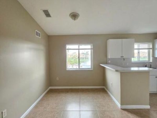 3490 Briar Bay Boulevard, Unit 206, West Palm Beach, FL 33411