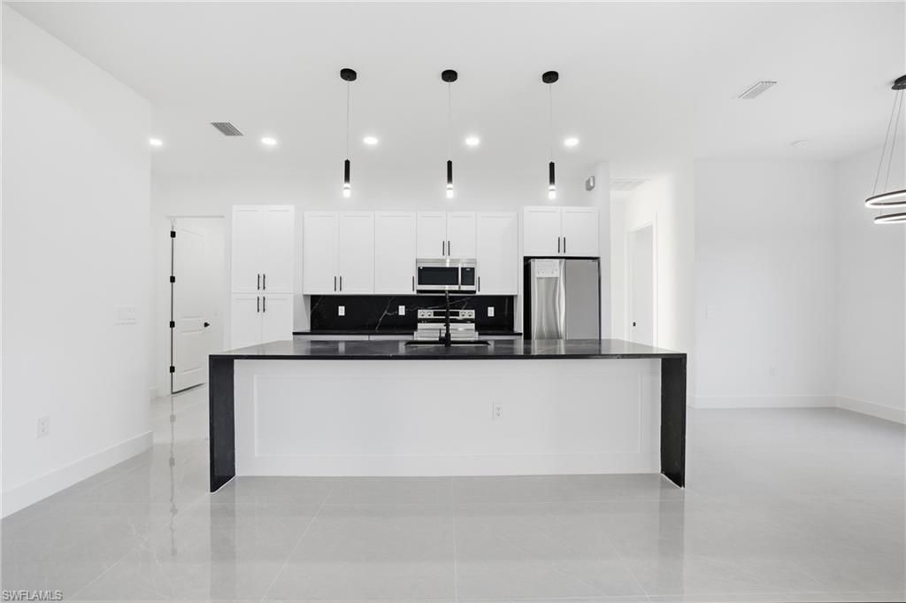 3109 28th St Sw, Lehigh Acres, FL 33976 Photo