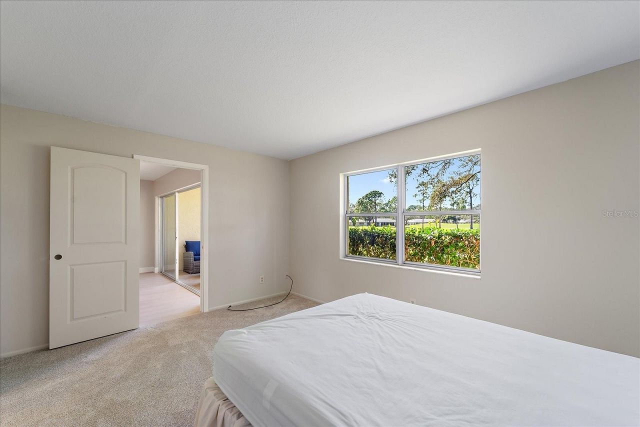 7860 Palm Aire Lane, Unit 104, Sarasota, FL 34243 Photo