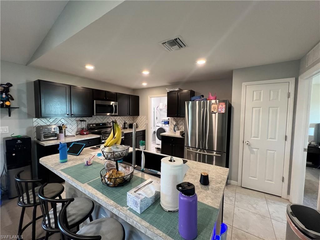 1143 NW 4th Pl, Cape Coral, FL 33993 Photo