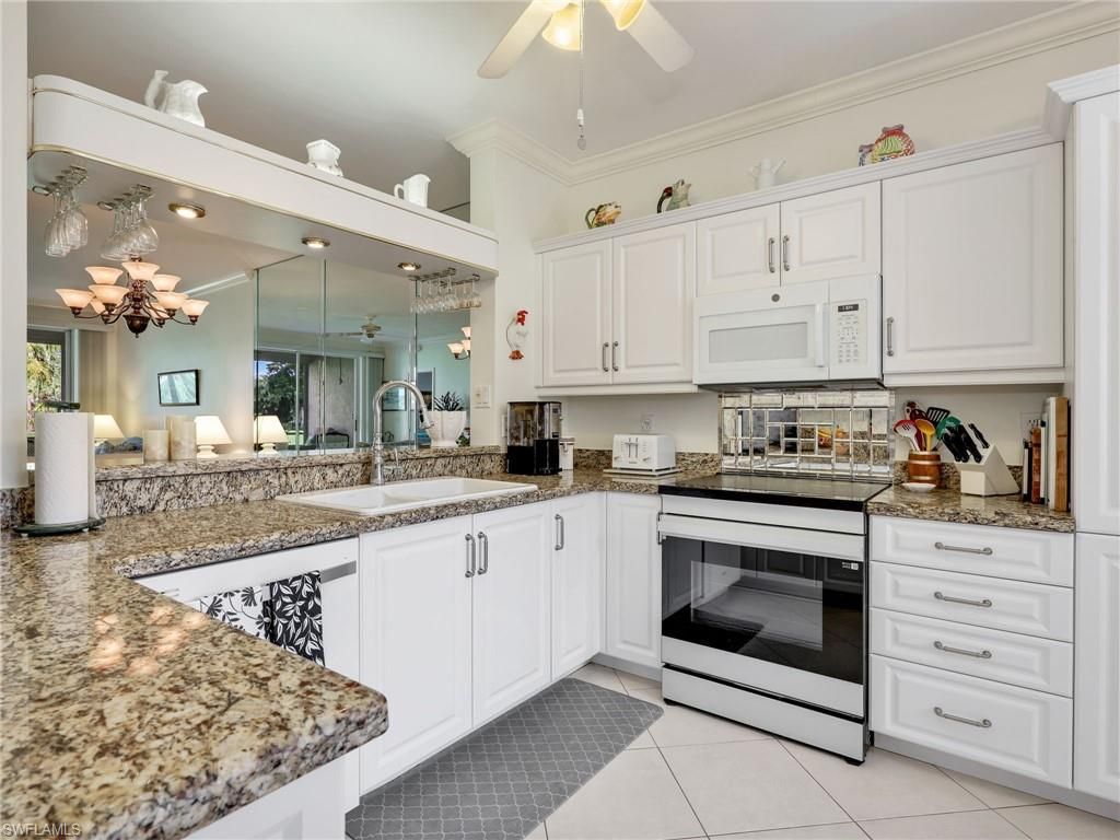 725 Saratoga Cir, Unit A101, Naples, FL 34104 Photo