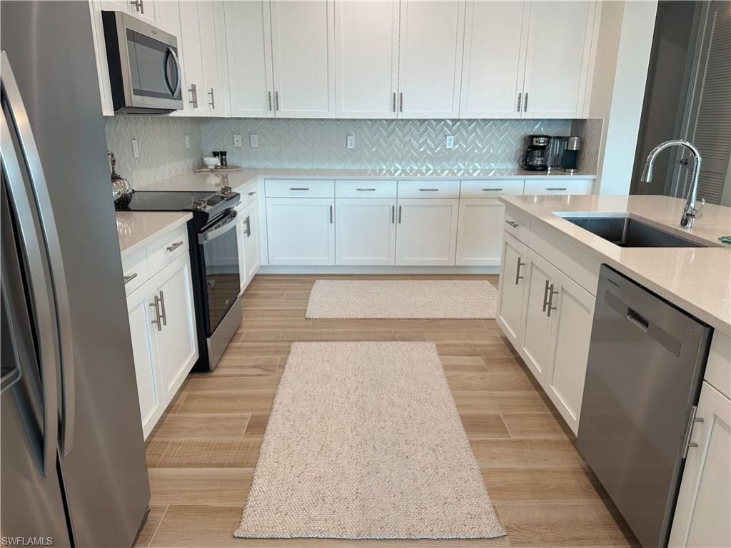 207 Indies Dr E, Unit 201, Naples, FL 34114 Photo