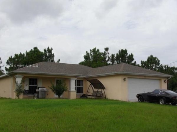 2605 35TH STREET SW, LEHIGH ACRES, FL 33976