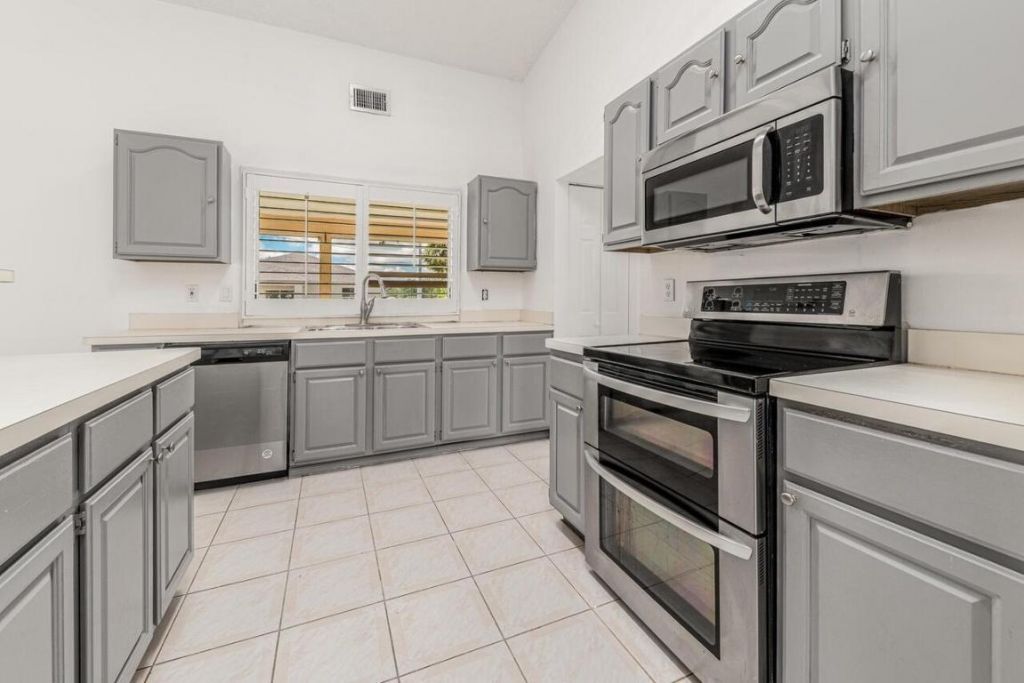 1126 SW Calmar Avenue, Port Saint Lucie, FL 34953 Photo