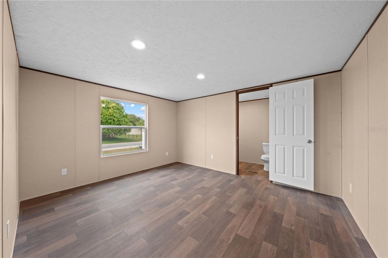 411 Lagoon Court, Kenansville, FL 34739 Photo