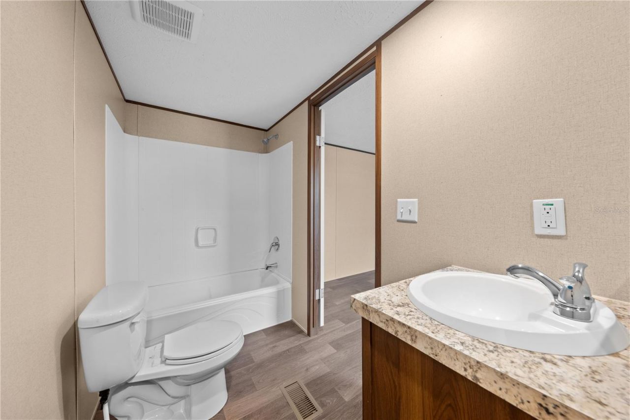 411 Lagoon Court, Kenansville, FL 34739 Photo