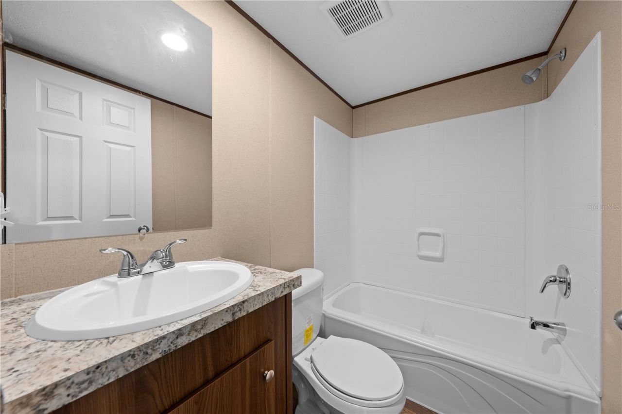 411 Lagoon Court, Kenansville, FL 34739 Photo