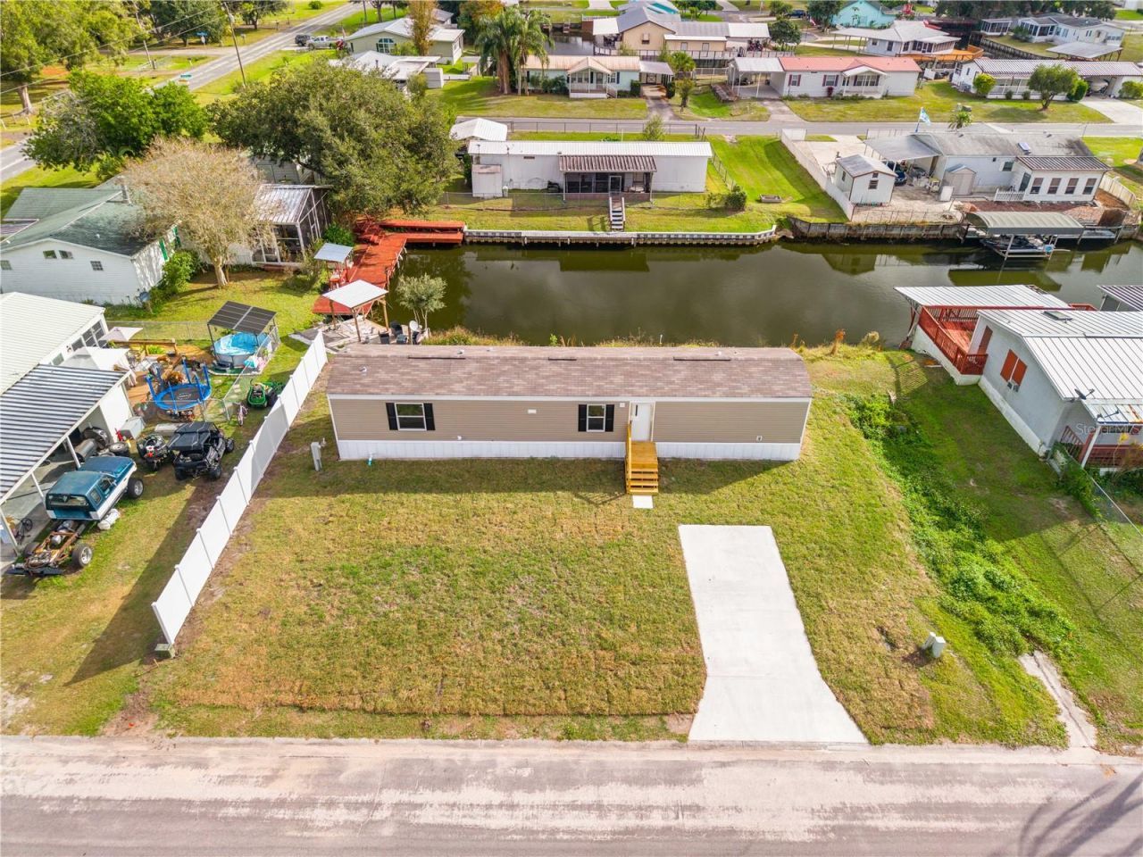 411 Lagoon Court, Kenansville, FL 34739 Photo