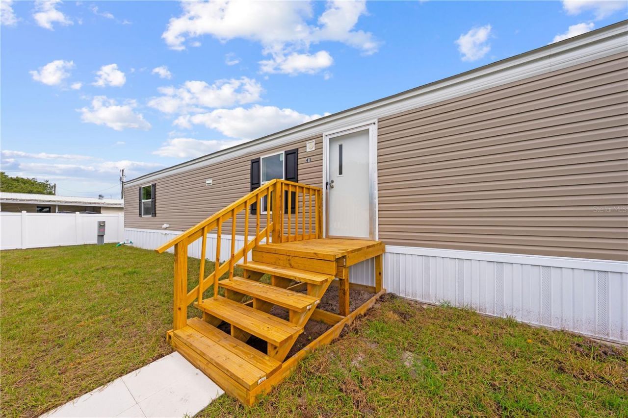 411 Lagoon Court, Kenansville, FL 34739 Photo