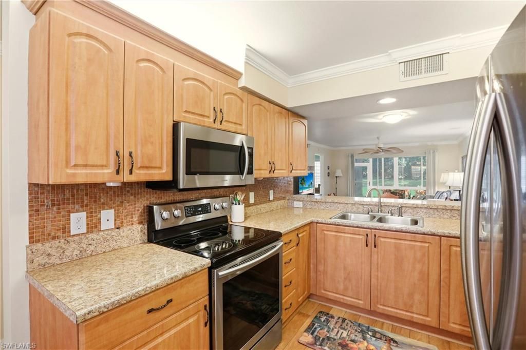 289 Robin Hood Cir, Unit 101, Naples, FL 34104 Photo