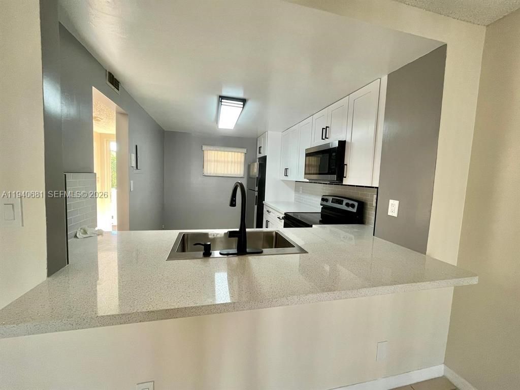 1100 NW 87th Ave, Unit 403, Coral Springs, FL 33071 Photo