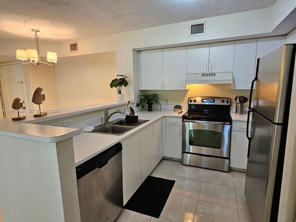 111 Yacht Club Way, Unit 106, Hypoluxo, FL 33462 Photo