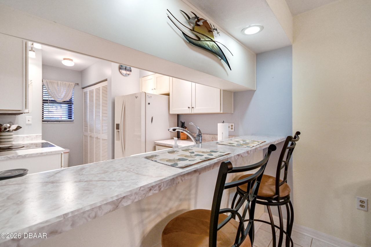 466 Bouchelle Drive, Unit 104, New Smyrna Beach, FL 32169 Photo