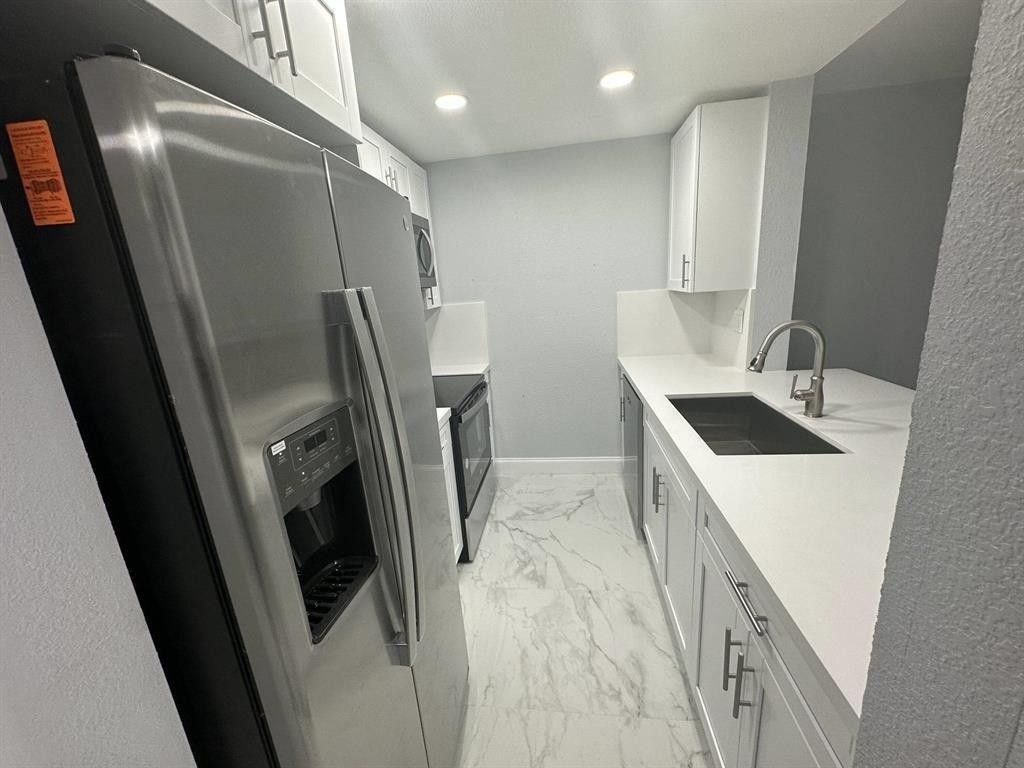 9430 Boca Cove Circle, Unit 203, Boca Raton, FL 33428 Photo