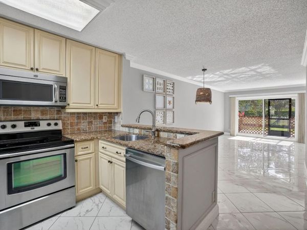 2230 N Cypress Bend Drive, Unit 108, Pompano Beach, FL 33069