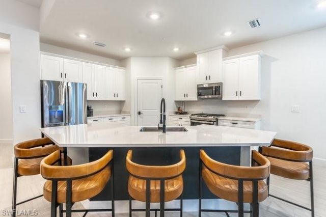16907 Fairgrove Way, Unit 201, Naples, FL 34110 Photo