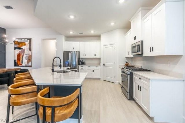 16907 Fairgrove Way, Unit 201, Naples, FL 34110 Photo