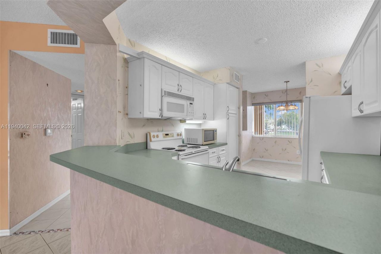 9587 Weldon Circle, Unit B205, Tamarac, FL 33321 Photo