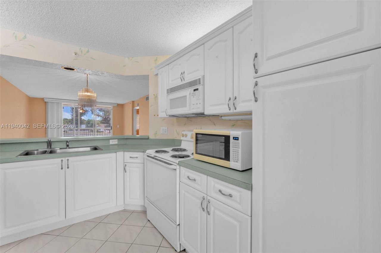 9587 Weldon Circle, Unit B205, Tamarac, FL 33321 Photo