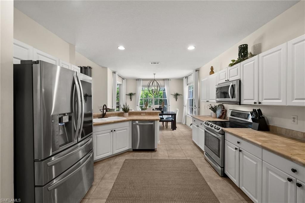 6996 Burnt Sienna Cir, Naples, FL 34109 Photo