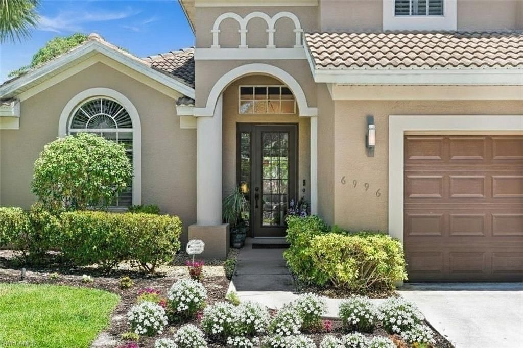 6996 Burnt Sienna Cir, Naples, FL 34109 Photo