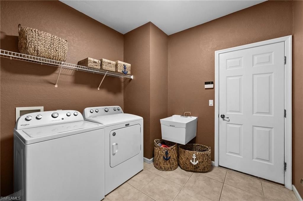 6996 Burnt Sienna Cir, Naples, FL 34109 Photo