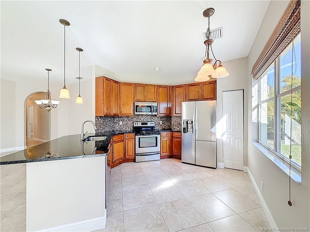 211 SW Deleon Springs Drive, Port Saint Lucie, FL 34986 Photo