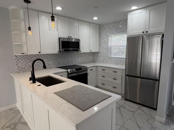 12007 Poinciana Boulevard, Unit 108, Royal Palm Beach, FL 33411