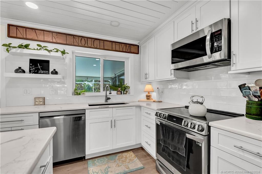 649 SE Calmoso Drive, Port Saint Lucie, FL 34983 Photo